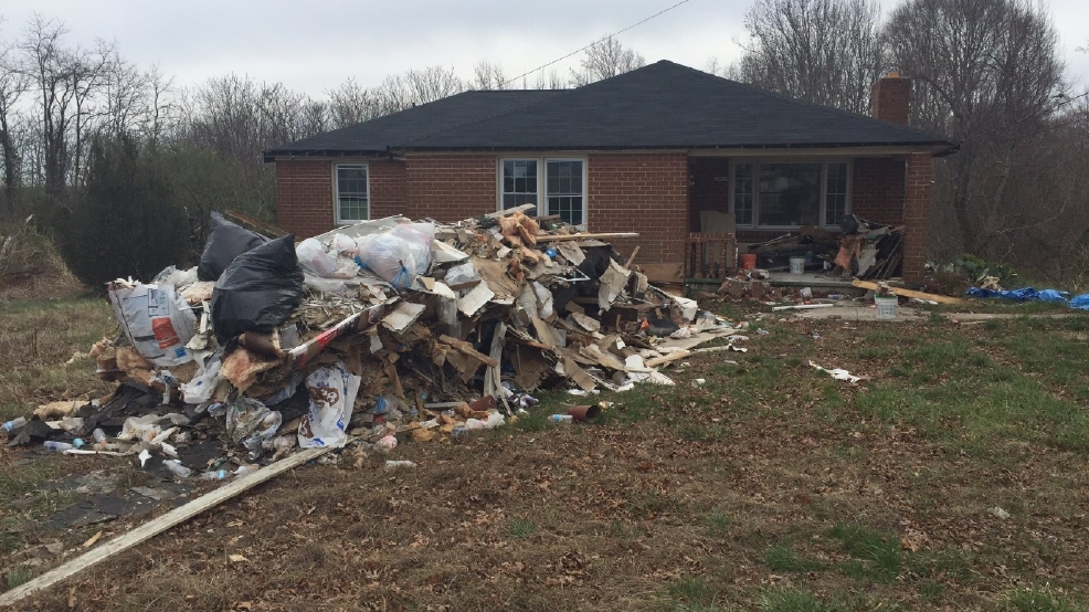 "It's just a mess" Neighbors want trash dumped in front of home