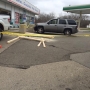 Car crashes into gas station, pinning clerk against wall