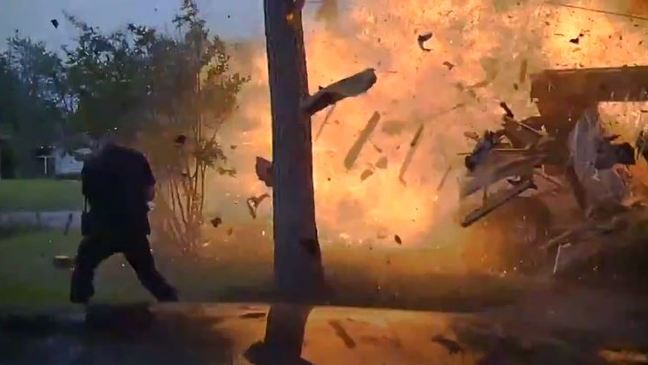 Video: Family trapped inside as house explodes